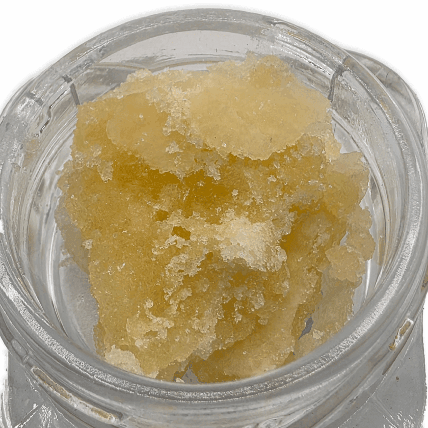 Close-up of SWEATZ live resin crumble with a golden, wet sugar texture